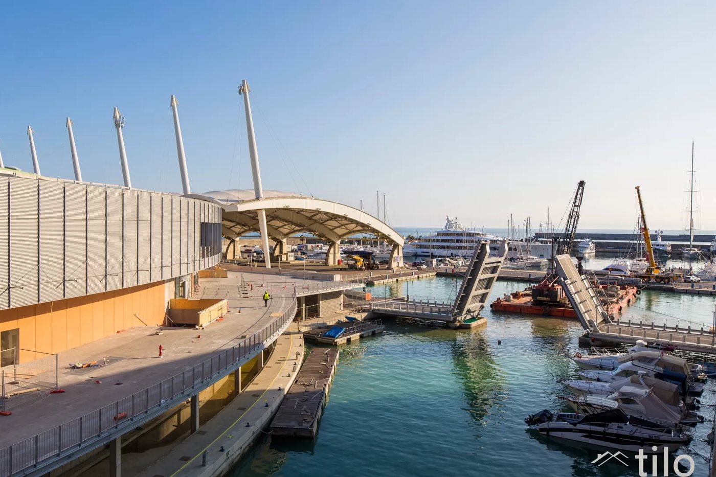 View of the Genoa marina from the terrace of a Tilo apartment